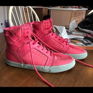 Bright pink high top sneakers